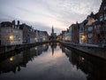 Postcard reflection of Poortersloge in Spiegelrei river canal historic city center Bruges West Flanders Flemish Belgium