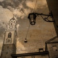 Postcard in retro look of the tower of the St. Nicholas church in Merano, South Tyrol Royalty Free Stock Photo