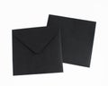 Two black envelopes on grey background. Postcard template. Royalty Free Stock Photo