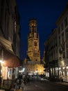 Postcard view of illuminated Belfry of Bruges Belfort van Brugge medieval historical bell clock tower at night Belgium Royalty Free Stock Photo