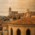 Postcard in vintage look of the old town of the city Girona, Spain, with cathedral