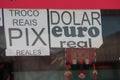 Poster advertising dollar, brazilian real and argentine peso currency exchange Royalty Free Stock Photo