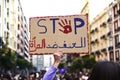 Poster attached by a protester with the word Stop in english and arabic during a demonstration Royalty Free Stock Photo