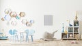 Poster frame mock up in children`s playroom interior with toys, kids furniture, table with chairs, shelves, scandinavian style, 3 Royalty Free Stock Photo