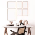 Poster frame mock up in home office interior, modern furniture and wooden white desk and rattan black chair