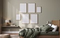 Poster frame mockup in bright bedroom interior background with rattan wooden furniture