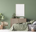 Poster frame mockup in Farmhouse Bedroom, green room interior design with natural wooden furniture Royalty Free Stock Photo