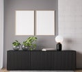 Poster frame mockup in simple home interior with black furniture