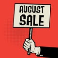 Poster in hand, business concept with text August Sale