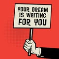 Poster in hand, business concept with text Your Dream is Waiting
