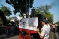 A poster of Joko Widodo-Kalla in front of a steam train Royalty Free Stock Photo