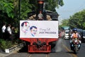 A poster of Joko Widodo-Kalla in front of a steam train Royalty Free Stock Photo