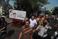 A poster of Joko Widodo-Kalla in front of a steam train Royalty Free Stock Photo