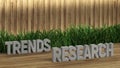Poster lettering Trends Research. Large letters on a wooden table. Modern decorative grass, backlit wall of wooden battens. Great