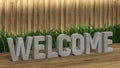 Poster lettering Welcome. Large letters on a wooden table. Modern decorative grass, backlit wall of wooden battens. Great loft