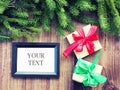 Poster mock up template for Christmas holiday. Christmas photo frame mock up template with decoration on wooden table. two boxes Royalty Free Stock Photo