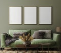 Poster mockup in home interior with green sofa, table and decor