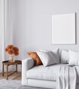 Poster mockup in a minimal living room design, empty frame on a white interior background