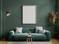 Poster mockup with vertical frame on empty dark green wall with green velvet sofa Royalty Free Stock Photo