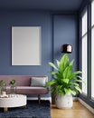 Poster mockup with vertical frames on empty dark blue wall in living room interior with pink velvet sofa Royalty Free Stock Photo