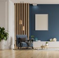 Poster mockup with vertical frames on empty dark blue wall in living room interior with blue velvet armchair Royalty Free Stock Photo