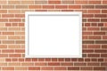 Poster Mockup with White Frame on Red Brick Wall