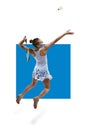 Poster. Motivated athlete in motion, young girl, badminton player hitting shuttlecock in jump isolated over white Royalty Free Stock Photo