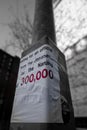 Poster about Nanjing Massacre on a telegraph pole in Manchester, vertical