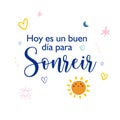 A poster that says in spanish. Today is a good day to smile. Calligraphy.