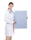 Poster, sign and happy portrait of doctor in white background, studio and mock up space. Medical, information and woman Royalty Free Stock Photo