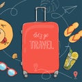 Poster on the theme of summer travel, leisure and adventure. A large suitcase on wheels and summer accessories on a dark Royalty Free Stock Photo