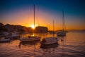 POSTIRA, CROATIA - JULY 12, 2017: Lots of fancy yachts at the sunset in the harbor of a small town Postira - Croatia, island Brac