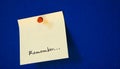 Postit with remember note Royalty Free Stock Photo