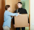 Postman brought package Royalty Free Stock Photo