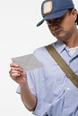 Postman holding a letter