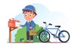 Postman delivering letter in post box by bicycle Royalty Free Stock Photo