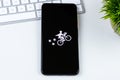 Postmates app logo on a smartphone screen. Royalty Free Stock Photo