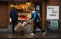 POSTNORD DELIVERY MAN WITH PACKETS