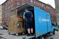 Postnord parcel and packet delivery van in Copenhagen