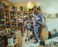 POSTOJNA, SLOVENIA - Aug 02, 2019: Couple visit local wine shop and sightsee Slovenian products