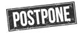 POSTPONE text on black grungy rectangle stamp