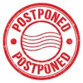 POSTPONED text written on red round postal stamp sign