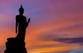 The Posture Of Walking Buddhist Statue In Twilight Silhouette