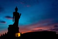 The Posture Of Walking Buddhist Statue In Twilight Silhouette