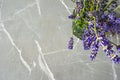 Posy of lavender flowers on an empty marble desk Royalty Free Stock Photo