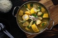 Pot of chicken soup with potato and corn Royalty Free Stock Photo