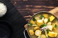 Pot of chicken soup with potato and corn Royalty Free Stock Photo