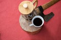 A pot of coffee holding by hand Royalty Free Stock Photo