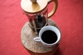 A pot of coffee holding by hand Royalty Free Stock Photo