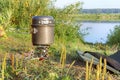 Pot and gas burner, breakfast tourist on the waterfront